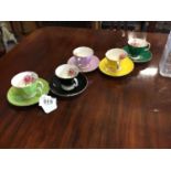 ADDERLY bone china - six saucers and five cups.