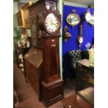 William IV. Mahogany drum head long cased clock.