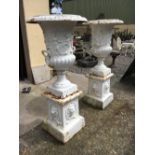 Large pair of decorative cast iron urns.