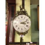 Early 19th C. French bracket clock with ceramic dial and brass mounts.