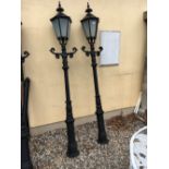 Pair of cast iron street lights.