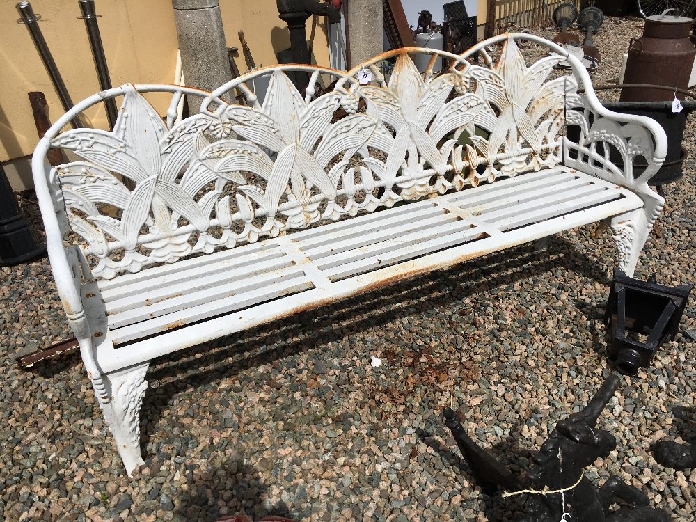 Cast iron four seater garden bench.