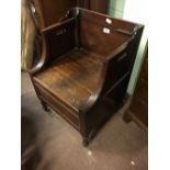 Unusual Georgian mahogany chair with brass casters.