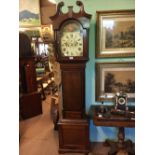 19th. C. mahogany long cased clock with painted arched dial.