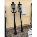 Pair of cast iron street lights.