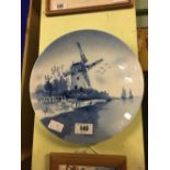 Blue and white ceramic wall plaque - Dutch Scene.