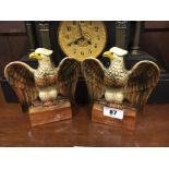 Pair of ceramic money banks in the form of eagles.