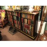 Mahogany floor bookcase in the Regency manner. (196 cm L x 95 cm H 24 cm D).