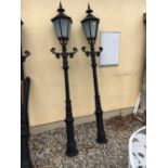 Pair of cast iron street lights.