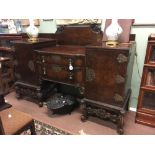 Edwardian walnut sideboard the gallery back above a sunken centre with two drawers flanked by two