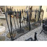 19th. C. wrought iron and cast iron entrance gates. (250 cm L x 139 cm H).