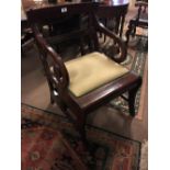 Mahogany metamorphic library chair.