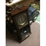 1930's oak wall clock.