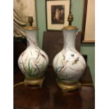 Pair of 19th C. Oriental table lamps on gilded brass base.