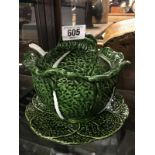 Soup tureen in the form of a cabbage with original ladle.