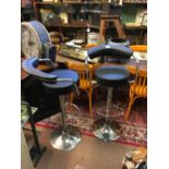 Pair of chrome swivel chairs.