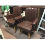 Pair of Art Deco style leather upholstered armchairs.