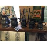 Collection of six pewter tankards and measures.