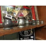 Set of 19th. C pewter measures.