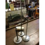 Two Art Deco chrome and bakelite shirt stands and two later stands.