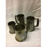 Collection of four silver-plated and pewter tankards.