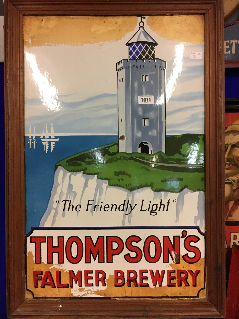 Rare THOMPSON'S FALMER BREWERY The Friendly Light framed enamel sign.