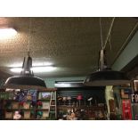 Five Retro industrial enamel light shades.