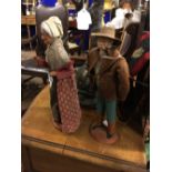Two terracotta character dolls