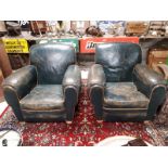 Pair of 1940's green leather upholstered club chairs.