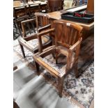 Pair of early 20th. C. elm open armchairs.