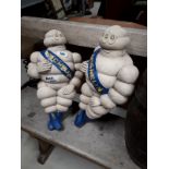 Pair of original MICHELIN plastic advertising men.