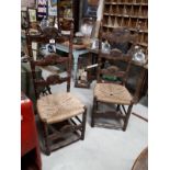 Pair of carved oak hall chairs.