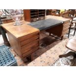 1950's teak office with inset leather top in the Danish style.