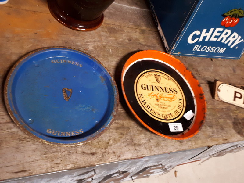 Two GUINNESS advertising trays.