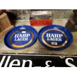 Two HARP LAGER advertising trays.