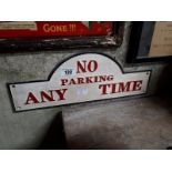NO PARKING ANY TIME cast iron plaque.