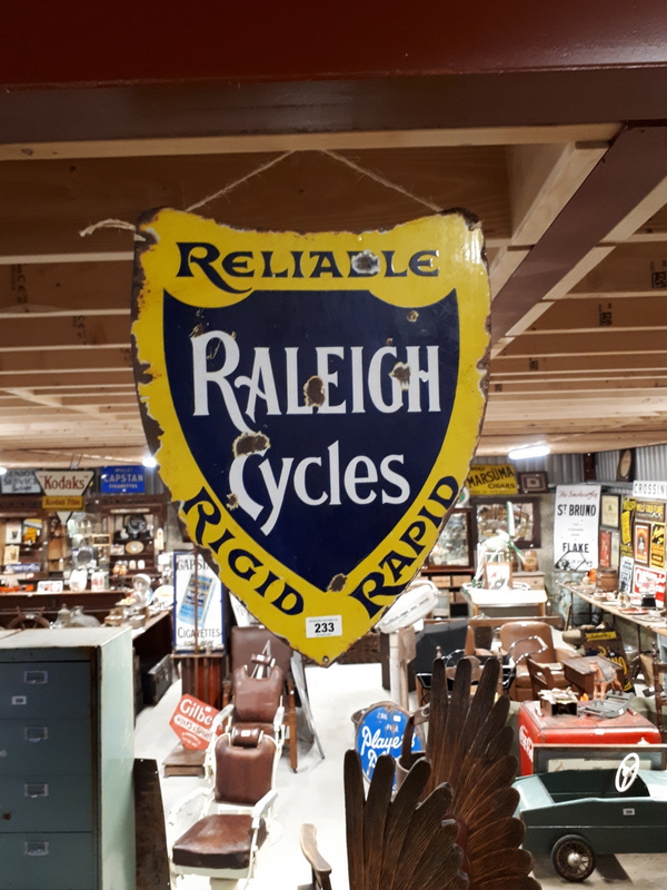 Reliable RALEIGH CYCLES Rigid Rapid shield shaped enamel double sided advertising sign.