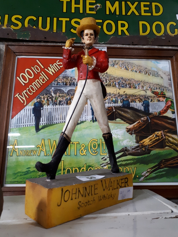 JOHNNIE WALKER bar advertising figure.