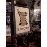 R Brown Chemist's advertising sign.
