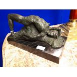 Bronze figure of reclining Lady on marble base.