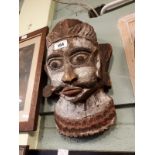 Polynesian carved wooden mask.