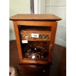 19th. C. pipe cabinet with some PETERS pipes included.