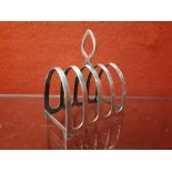 English silver toast rack. Hallmarked in Birmingham.