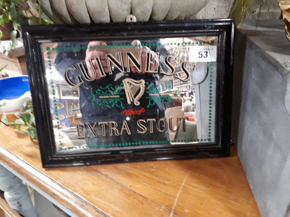 Guinness Extra Stout advertising mirror.