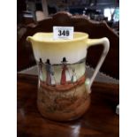 Royal Doulton ceramic jug with pictorial scenes.