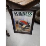 Framed Guinness advertising print.