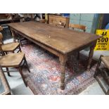 19th C. elm kitchen table on turned legs.