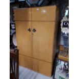 Art Deco maple and rosewood veneered two door wardrobe.