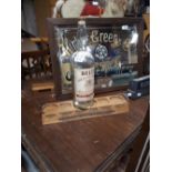 Large vintage Bell's Whisky bottle and Irish Whiskey display stand.