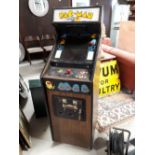 1980s Pac Man arcade machine.